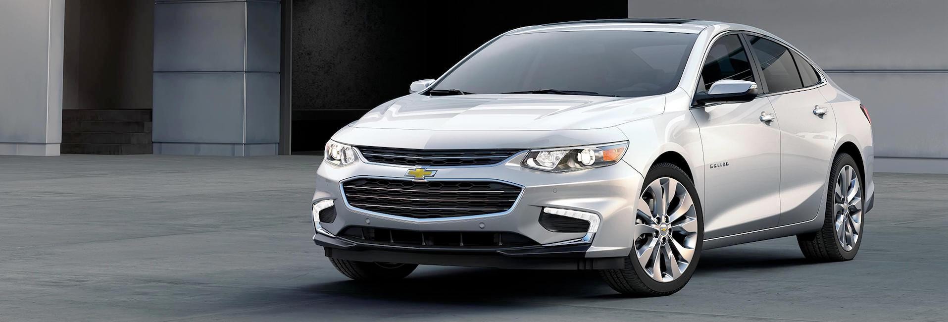 A silver 2018 Malibu parked on the street