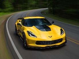 A 2018 Chevy Corvette Z06 Driving down an empty street.