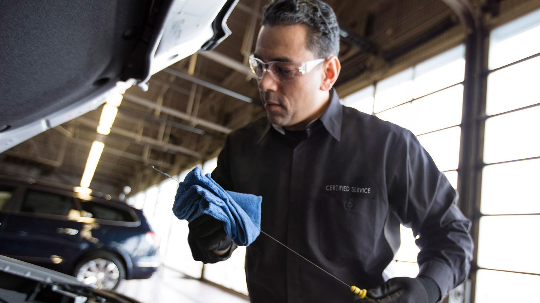 Thompsons Buick GMC - Buick Tech changes oil= Placerville, California