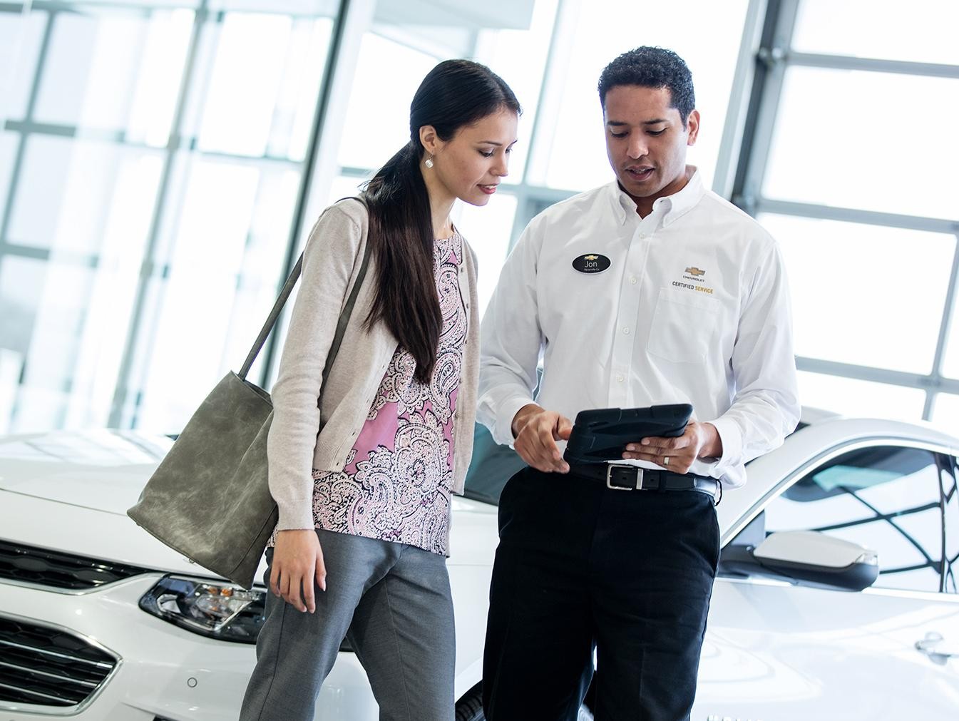 Chevrolet service representative speaking with customer