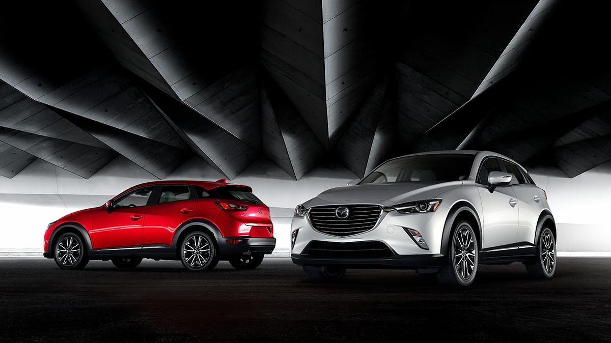 2017 Mazda CX3 shown side by side in a dark garage.